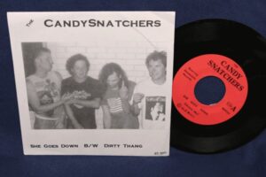 The Candy Snatchers She Goes Down poster with a CD